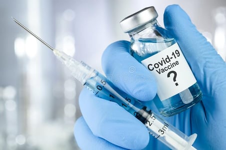 possible-cure-concept-hand-blue-medical-gloves-holding-coronavirus-covid-virus-vaccine-vial-possible-cure-hand-173655330